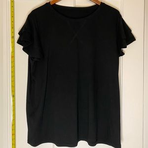 black shirt with ruffle sleeves